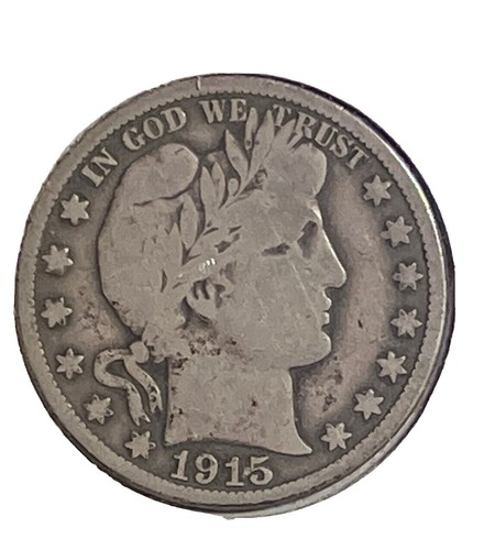 1915 Barber half dollar off-center strike showing dramatic planchet shift with date visible
